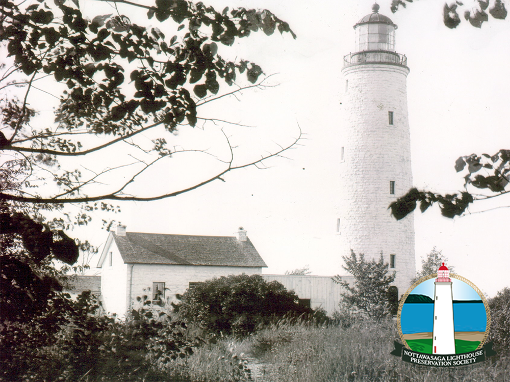 The Nottawasaga Lighthouse seen in better days with Lighthouse keeper's house and a nice coat of whitewash.